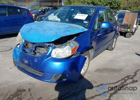 2013 Suzuki Sx4 Le/Le Popular z USA, uszkodzony, nr VIN JS2YC5A37D6100542